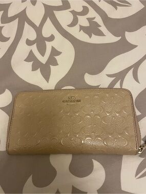 Coach Embossed Signature Zip Wallet in Beige